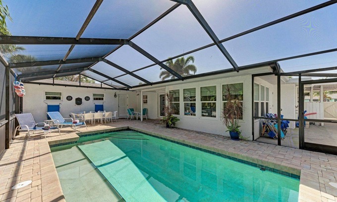 Anna Maria House | Periwinkle Getaway: 2 Blocks to the Beach, Private Pool by Anna Maria Life Vacation Rentals