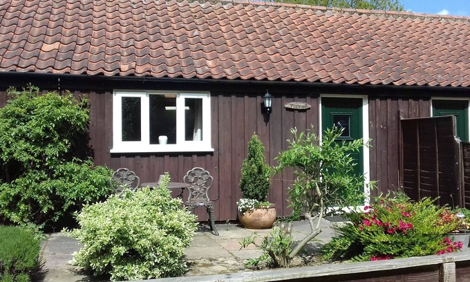 Thorpe Market Cottage | Pinewood Cottage - Set Around An Old Farmyard In A Village Location