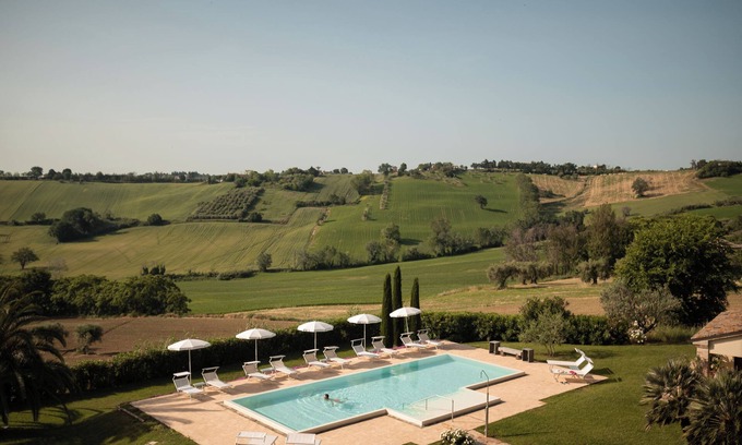 Monte San Vito House | Poggio Antico - Suites and Breakfast