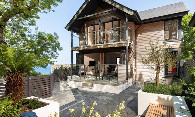 Carbis Bay House | Porthia, stylish and spacious inside and out. Sunny terraces with sea views. Garage parking. Free WiFi.