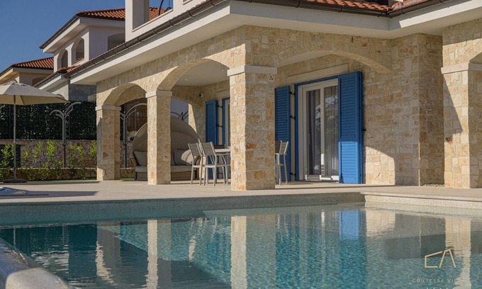Sveti Vid-Miholjice Apartment | Premium apartment Loma One with a pool and garden on Krk