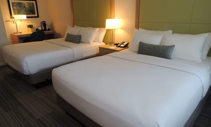Medical Center Area Hotel | Premium Two Queen Room, Longwood Inn, Dining, Near Medical Schools