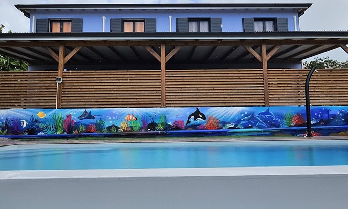 Vieux-Habitants Apartment | Pretty apartment with shared swimming pool less than 1km from the sea