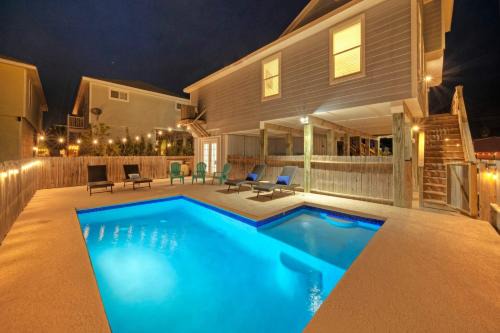 Port Aransas House | Private Pool Game Room Patio Near the Beach Palm House by AvantStay