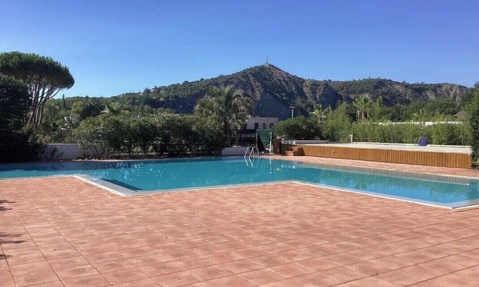 Ruoms Apartment | Quiet, bright apartment with private garden and shared pool.