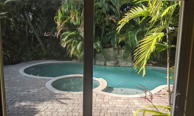 Poinsettia Heights House | Quintessential Florida Oasis Home