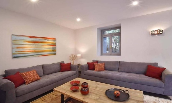 Filopappou Villa | R 963 Villa Cletus Philopappou with 65-inch flat-screen TV, Jetted bathtub & Fireplace.