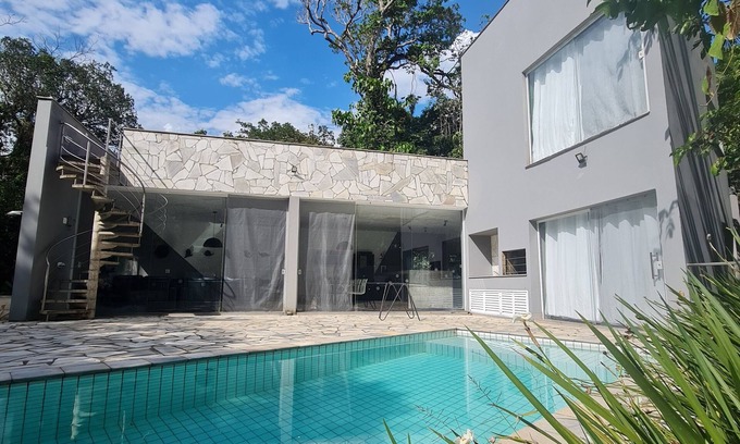 Guaratuba House | Refuge on Guaratuba beach, immersed in the Restinga de Bertioga State Park