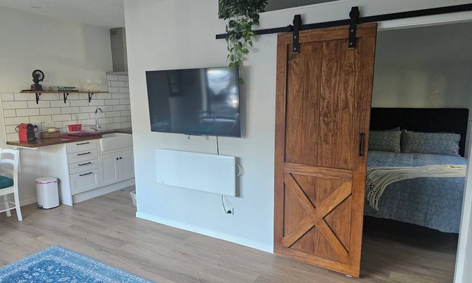 Long Bay Apartment | Relax and enjoy the North Shore in this cozy and stylish unit.