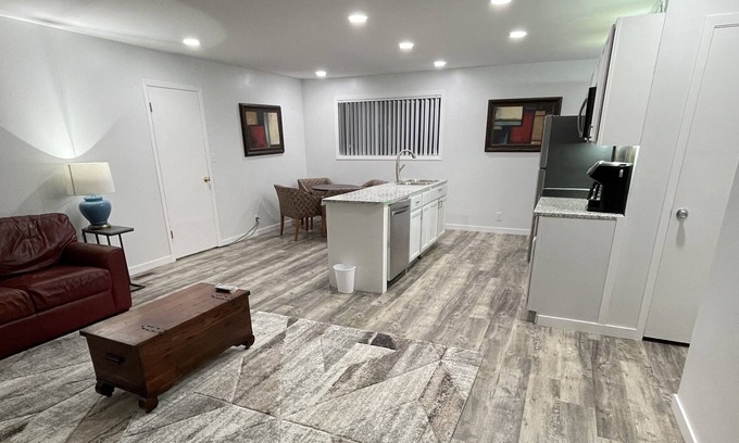 Lawrence House | Remote office get away with 1 gig wifi, huge deck, huge back yard and fire pit.