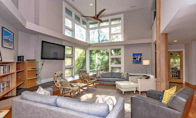 Bald Head Island House | Resting in treetop, two golf carts close to island amenities