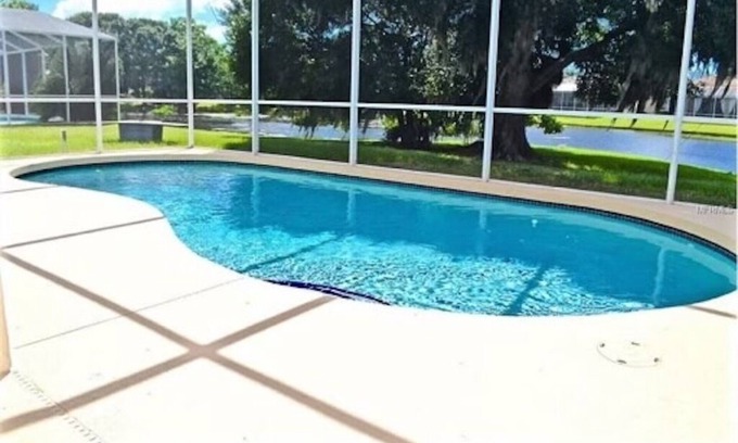 River Pointe House | River Pointe Lakefront 3 BR Ranch Home with Heated Pool