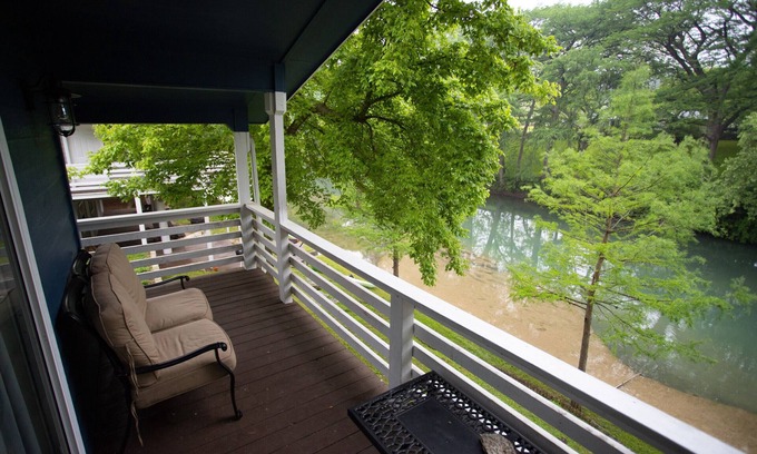 New Braunfels Ski Chalet | Riverfront Home Sleeps 12 with View & Firepit