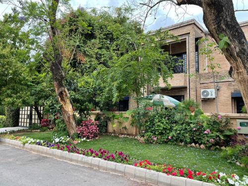 F-8 Sector House | Riviera Courtyard Guest House Islamabad