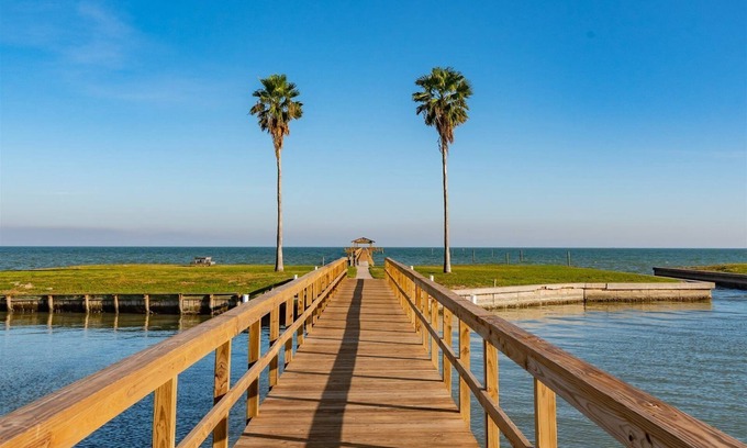 Sailhouse House | Rockport Racquet and Yacht Club condo with lovely bay views, tree covered grounds, pool, and fishing!