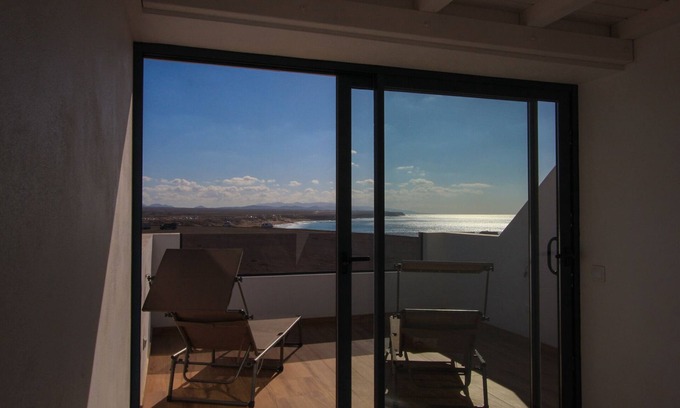El Cotillo Condo | Romantic Penthouse , breathtaking ocean views, beachfront