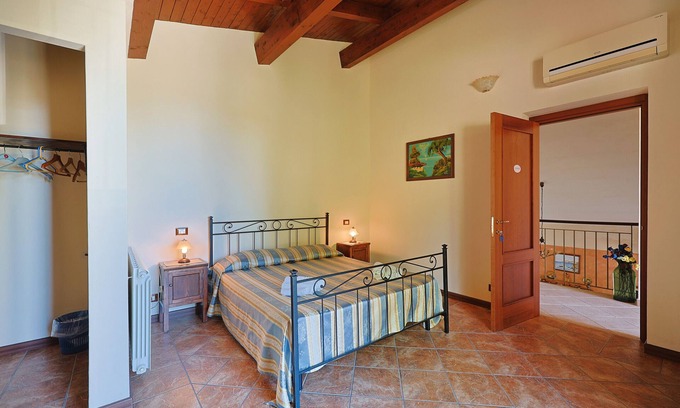 Patti Apartment | Room 'Lipari' with terrace, shared garden and air conditioning