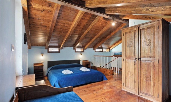 Meta Apartment | Room 'Matrimoniale Mansardata' with Shared Terrace, Wi-Fi and Air Conditioning