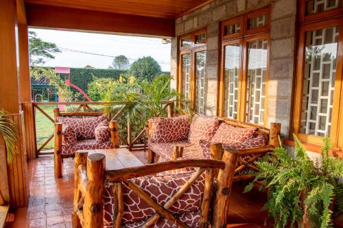 Nairobi House | Rustic Cottage With Chimney and Garden-UN Blue zone