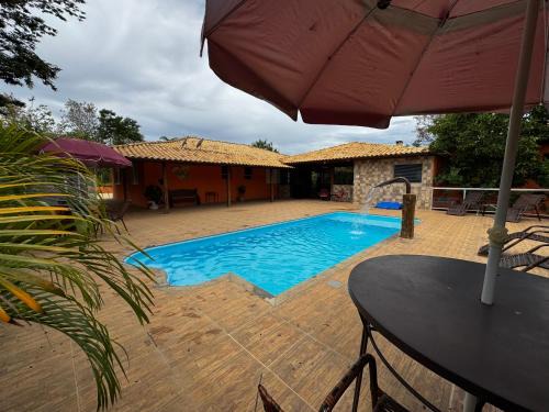 Almeida House | Sítio com área de lazer completa e piscina aquecida