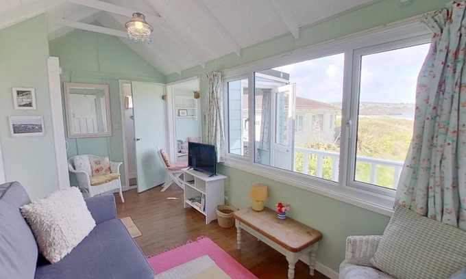 Hayle Ski Chalet | Sandford is a charming, traditional beach chalet, with great sea views.