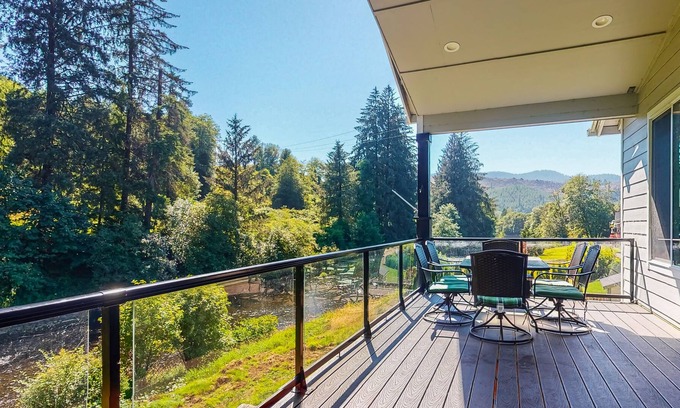 Beaver House | Scenic river-view retreat with patio, firepit, deck, grill, & game room