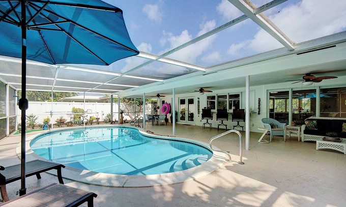 Deerfield Beach House | Screened-In Heated Pool and 5 min from the beach. Child friendly.