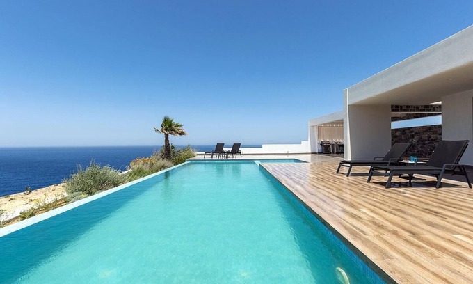 Agia Pelagia Villa | Seafront 4 bedroom villa with access to a beach