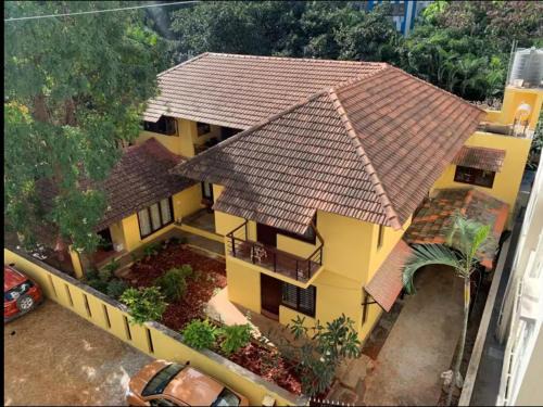 Agara House | Serene Cottage-Style Room near Indiranagar