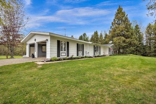 Little Suamico House | Serene Riverside Retreat home