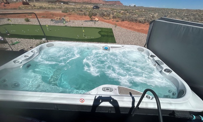 Kanab Bed & Breakfast | Shared space with owners. 2 bedroom and bath, swim spa, golf green,great views.
