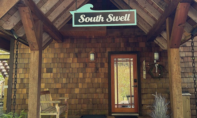 Tofino House | South Swell Tofino formerly Blue HeronnWaterfront home amid old growth cedars