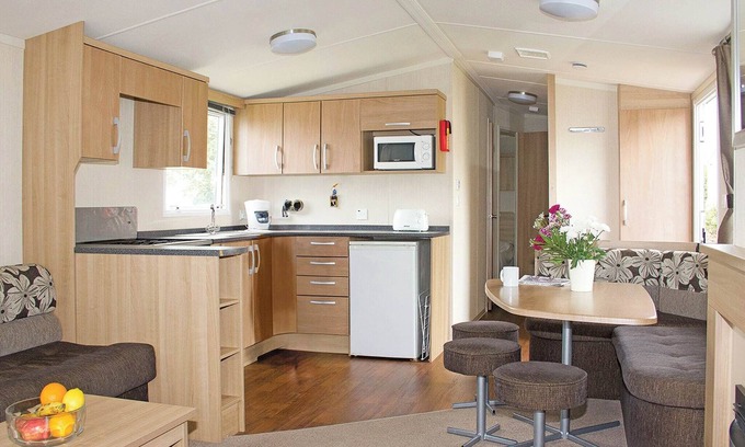 Looe House | Spacious 12ft-wide caravan with one double and two twin.