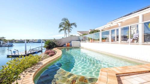 Banksia Beach House | Spacious Canal Home With Pontoon!