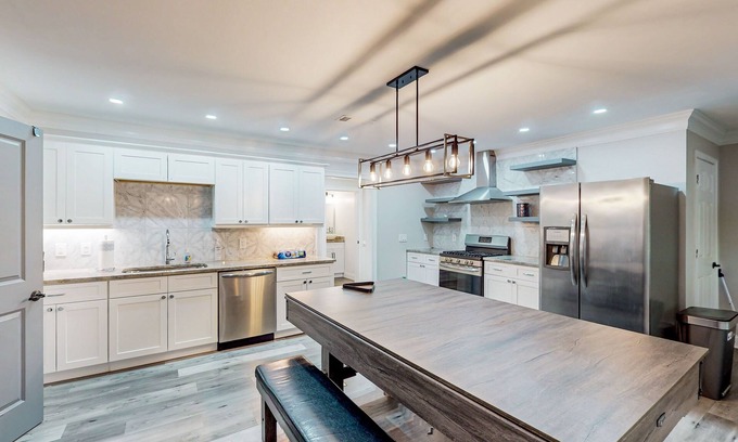 Roswell House | Spacious, dog-friendly home with home theater, game room & 2 kitchens