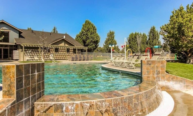 Redmond House | Spacious home with private deck, shared pool, and many resort amenities