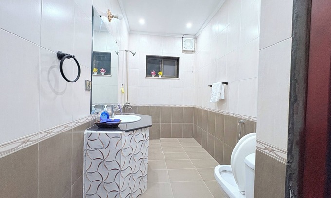 Lahore House | “Spacious King Rooms Prime DHA Location Perfect for Business & Family Stays