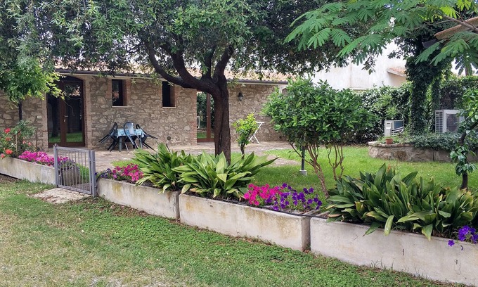 Grosseto Other | Spacious one-bedroom apartment with large bedroom, porch over entrance and pool