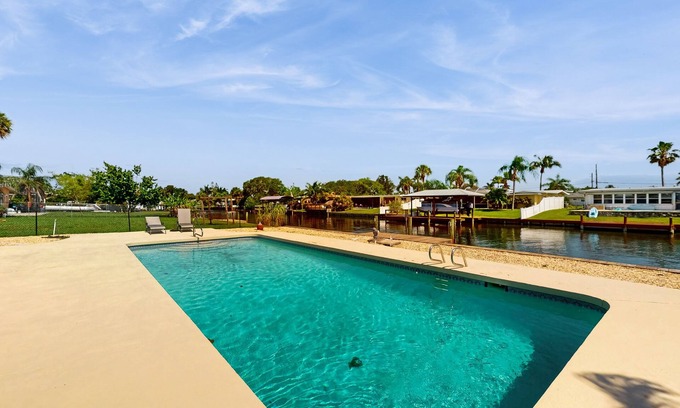 Venetian Way House | Spacious waterfront home with private pool, sunroom and dock.
