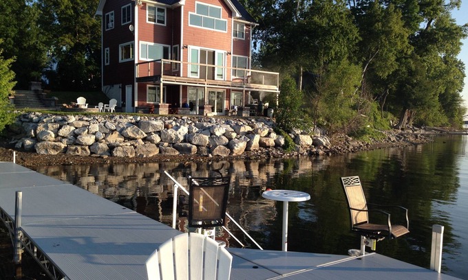 Alburg House | Spectacular Lakefront Home With Patio, Fire Pit, Large Dock and Work Booth.