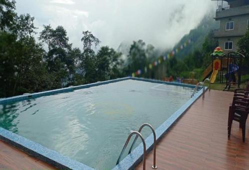 Gangtok Hotel | Staynest Z Resort Gangtok - swimming pool #gym #BAR #garden #parking