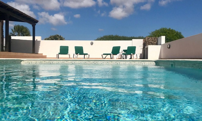 Lajares Villa | StayonBoard: Rustic villa with heated pool, view, patio, wifi, tv, .