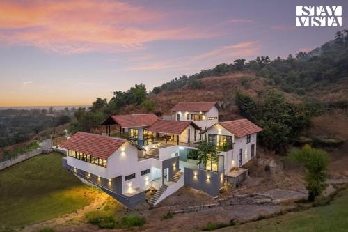 Korlai Villa | StayVista at Ekan with Sea views, Pool, WiFi