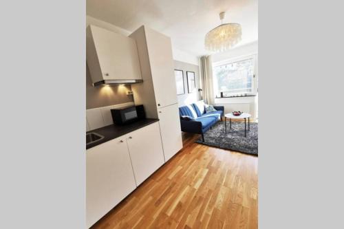 Bastad Apartment | Stilren studiolägenhet på 20 kvm nära havet och centrum! Stationsterrassen 7