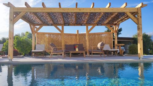 Faistos Apartment | Stonehouse Olivelia - Afrathias Beach
