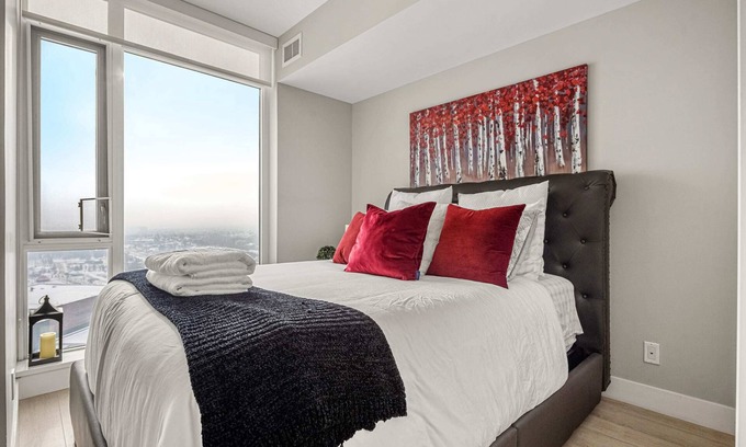 Victoria Park Condo | Stunning 34th Floor Views, PRIME Location, FREE Banff Pass, Parking, Wine!