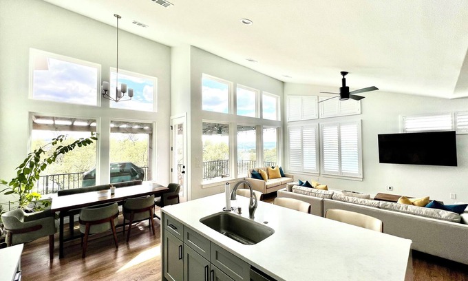 Point Venture House | Stylish and spacious, open concept home with great patio and views of the lake.