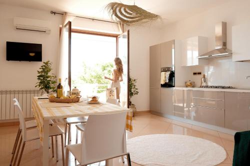 Gioiosa Marea Apartment | Sun-Filled Apartment, Breathtaking Coastal View, Gioiosa Marea, Limone by Ideal Sicily