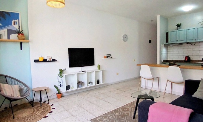 Puerto del Rosario Apartment | Sunlit apt steps from beach! Cozy and modern. Walk everywhere. Perfect getaway!