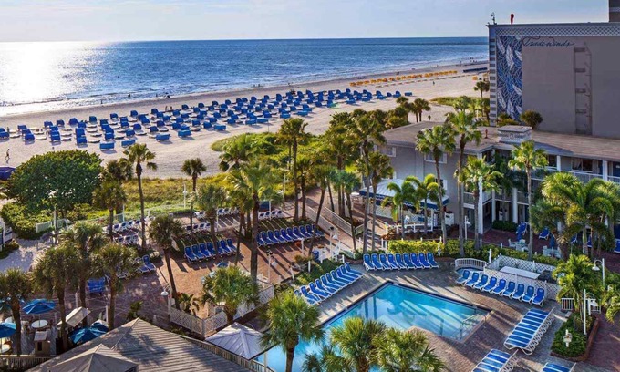 St. Pete Beach Hotel | Sunny Vacay! Relaxing View, Outdoor Pools, Parking, Dogs Allowed!